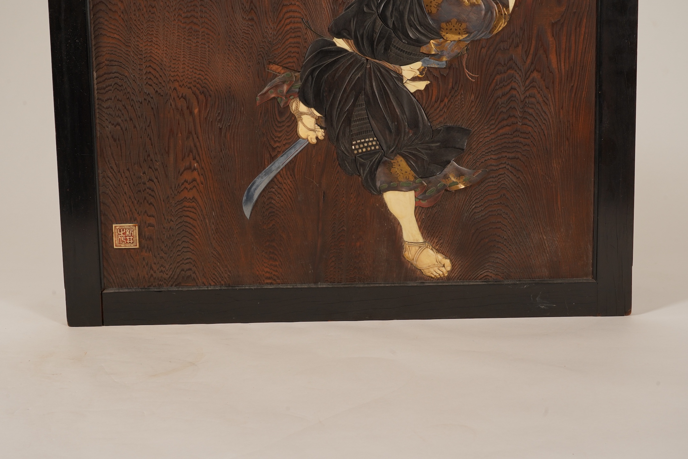 A Japanese inlaid persimmon wood tsuitate screen panel, Meiji period, possibly Tokyo School